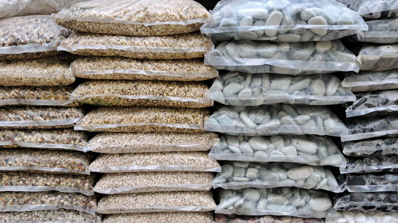 Bags of gravel and stone for a DIY patio remodel