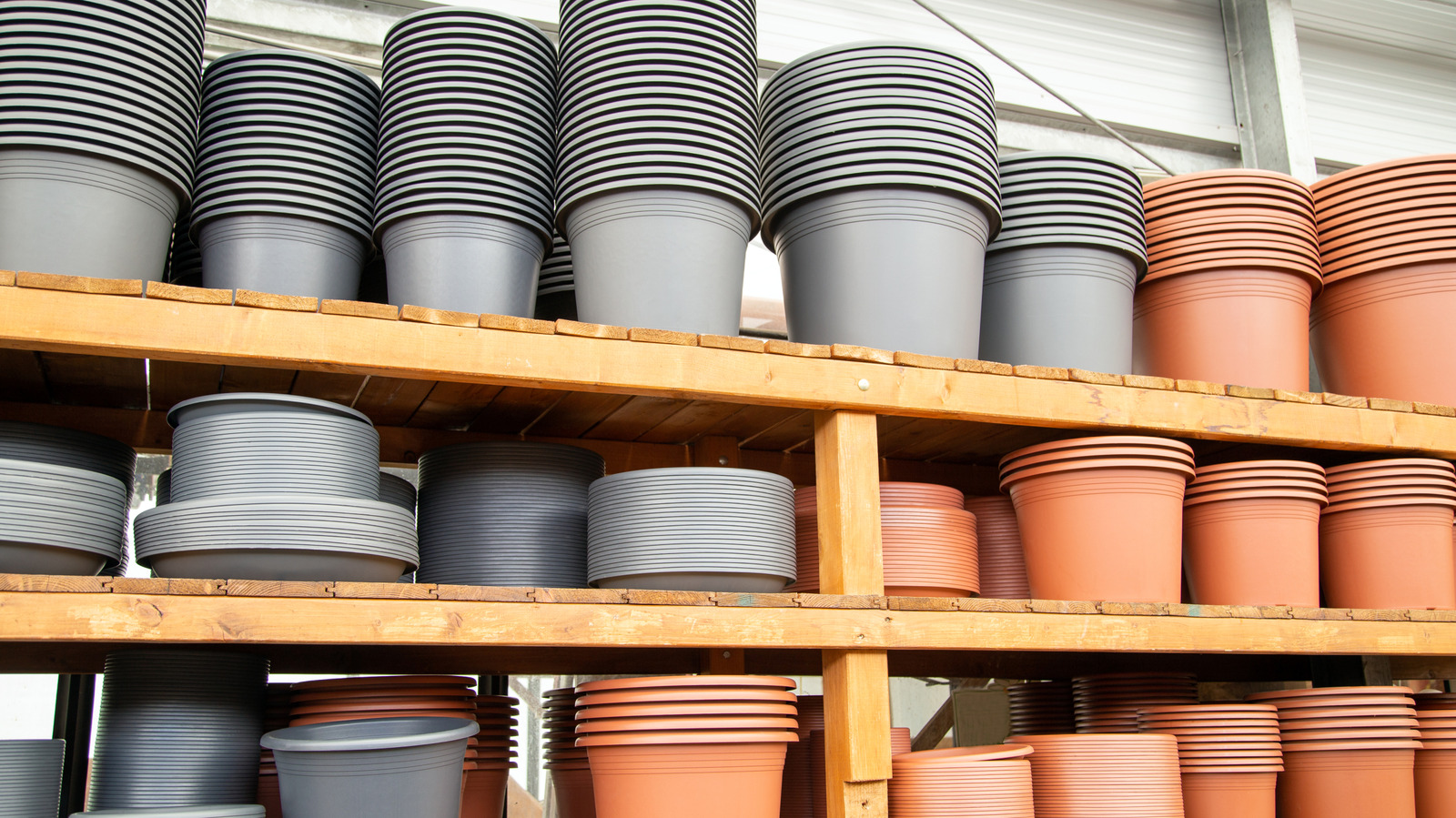 the-easy-diy-that-gives-any-plastic-planter-a-terracotta-upgrade
