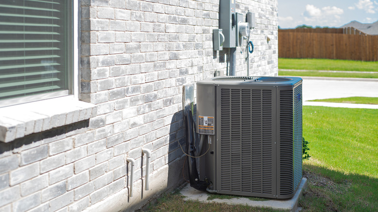 An air conditioning unit outside a home