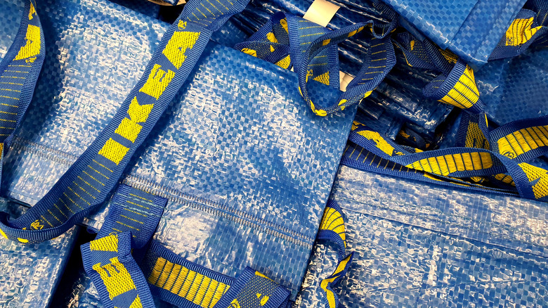 IKEA bags in the back of a car with products in them