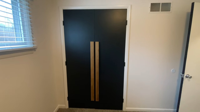 black closet doors with long wood handle makeover