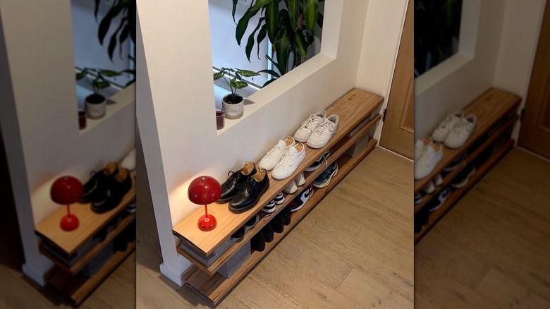 Shoe rack made of cinder blocks and lumber