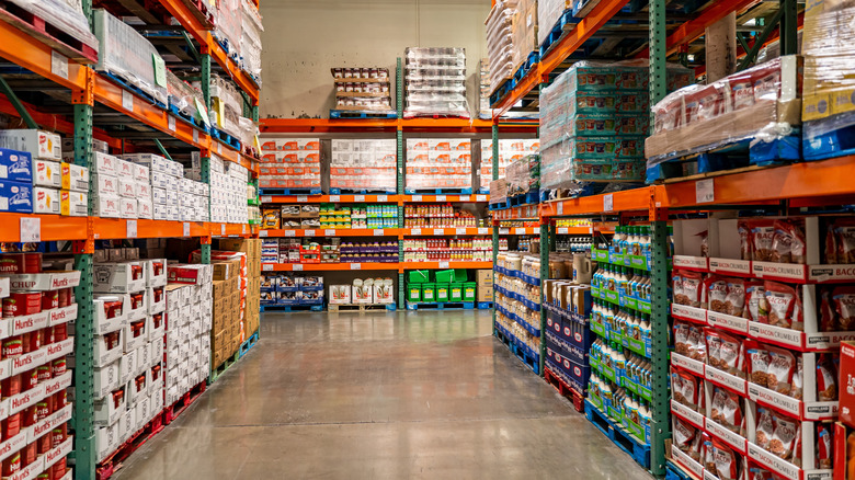An aisle in a Costco full of various food products