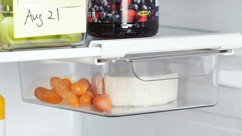 KLIPPKAKTUS Under shelf storage box with cheese and veggies inside