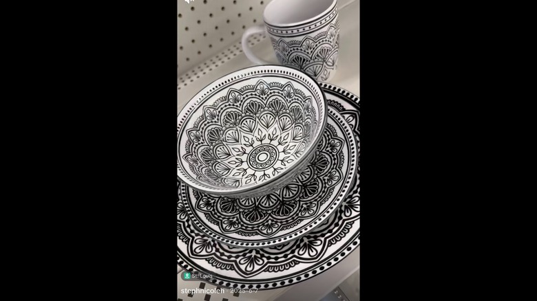 Screenshot of TikTok video showing the black and white patterned dinnerware at Dollar Tree.