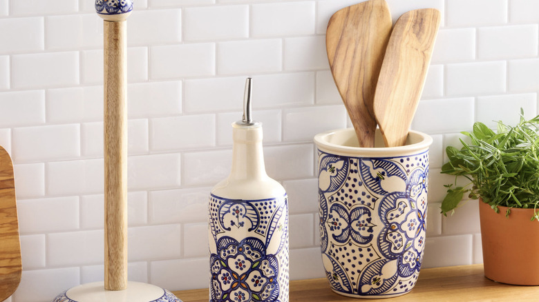 Ceramic utensil crock on kitchen counter