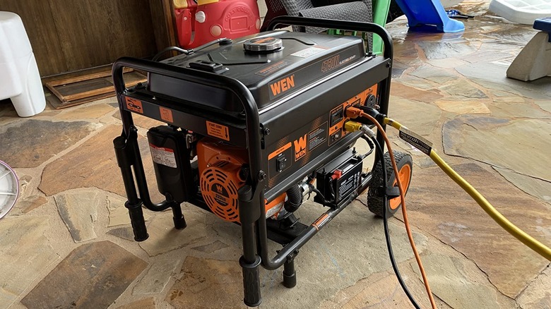 WEN 5600-Watt Portable Generator on a wooden floor