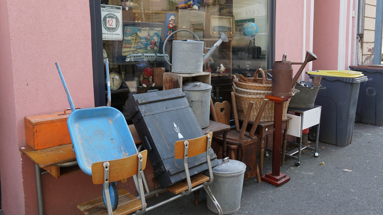 Gardening supplies sitting outside of a thrift store