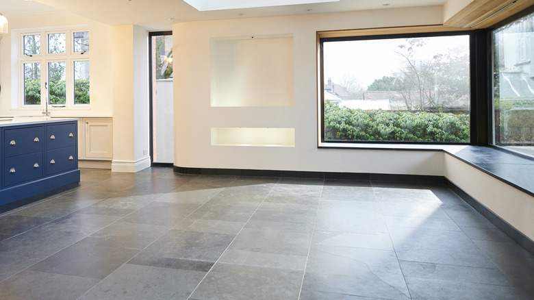 A modern interior with stone tile floors.
