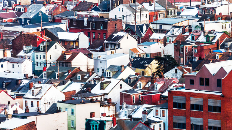 aerial view of well-populated neighborhood of homes that have a little snow on their roofs in Pittsburgh, Pennsylvania