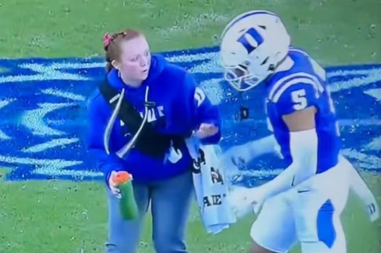 Fans slam Duke's Kimari Robinson for swatting female trainer's arm away as teammate lay injured