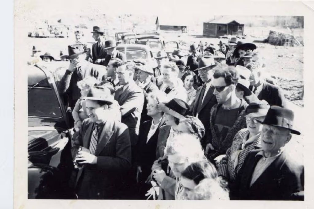 Man in sunglasses and hooded sweatshirt at 1941 Canadian bridge ceremony fuels online time travel claims