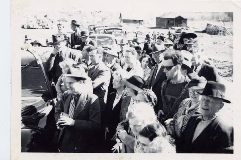Man in sunglasses and hooded sweatshirt at 1941 Canadian bridge ceremony fuels online time travel claims